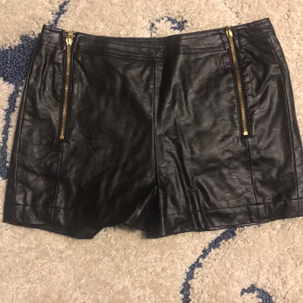 Black faux leather shorts